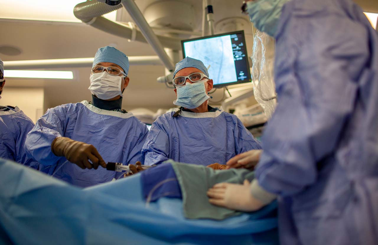 Two surgeons operating